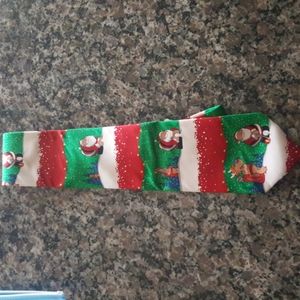 Christmas men's 100% silk tie w/ santa golfing & raindeer as caddy new w/tags